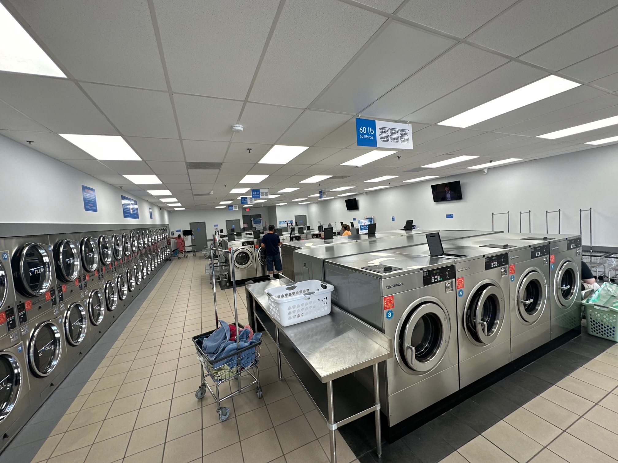 A picture of big washing machines in a self-service laundry located in Clearwater, Florida, taken by LaundroClean.